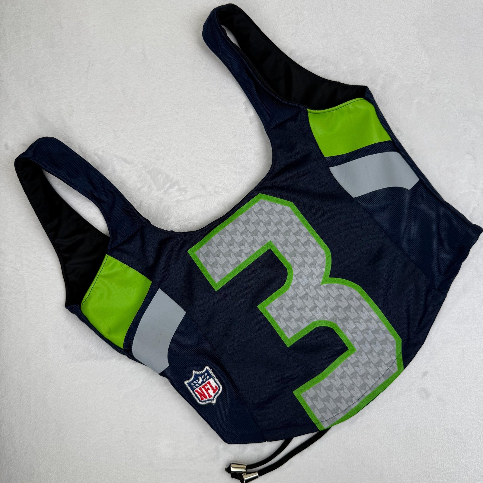 Seattle Seahawks tank top with bold team graphics, a sustainable upcycled design, and a revamped sporty style for dedicated Seahawks fans.