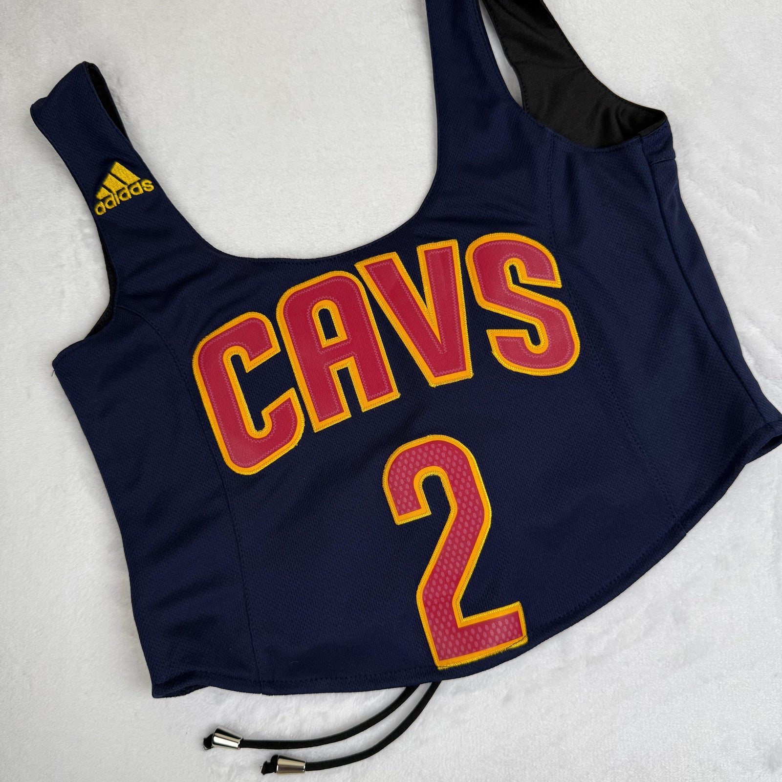One-of-a-kind Cavaliers NBA jersey tank top, perfect for Cleveland Cavaliers vintage apparel fans. | Custom tank top revamped from a basketball jersey, ideal for sporty fashion and game-day style.