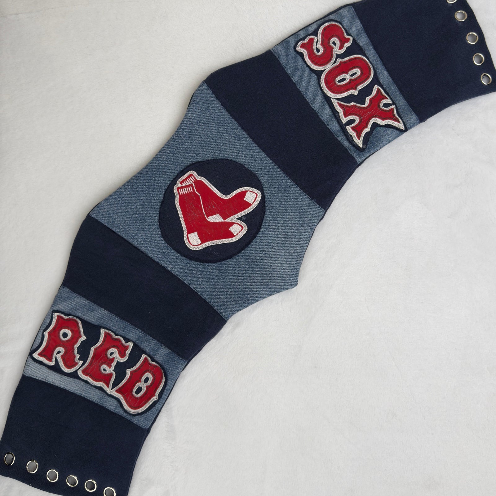 One-of-a-kind Boston Red Sox corset revamped from a thrifted jersey, perfect for Boston Red Sox apparel fans. | Custom corset revamped from thrifted materials, featuring a bold design for game-day style.
