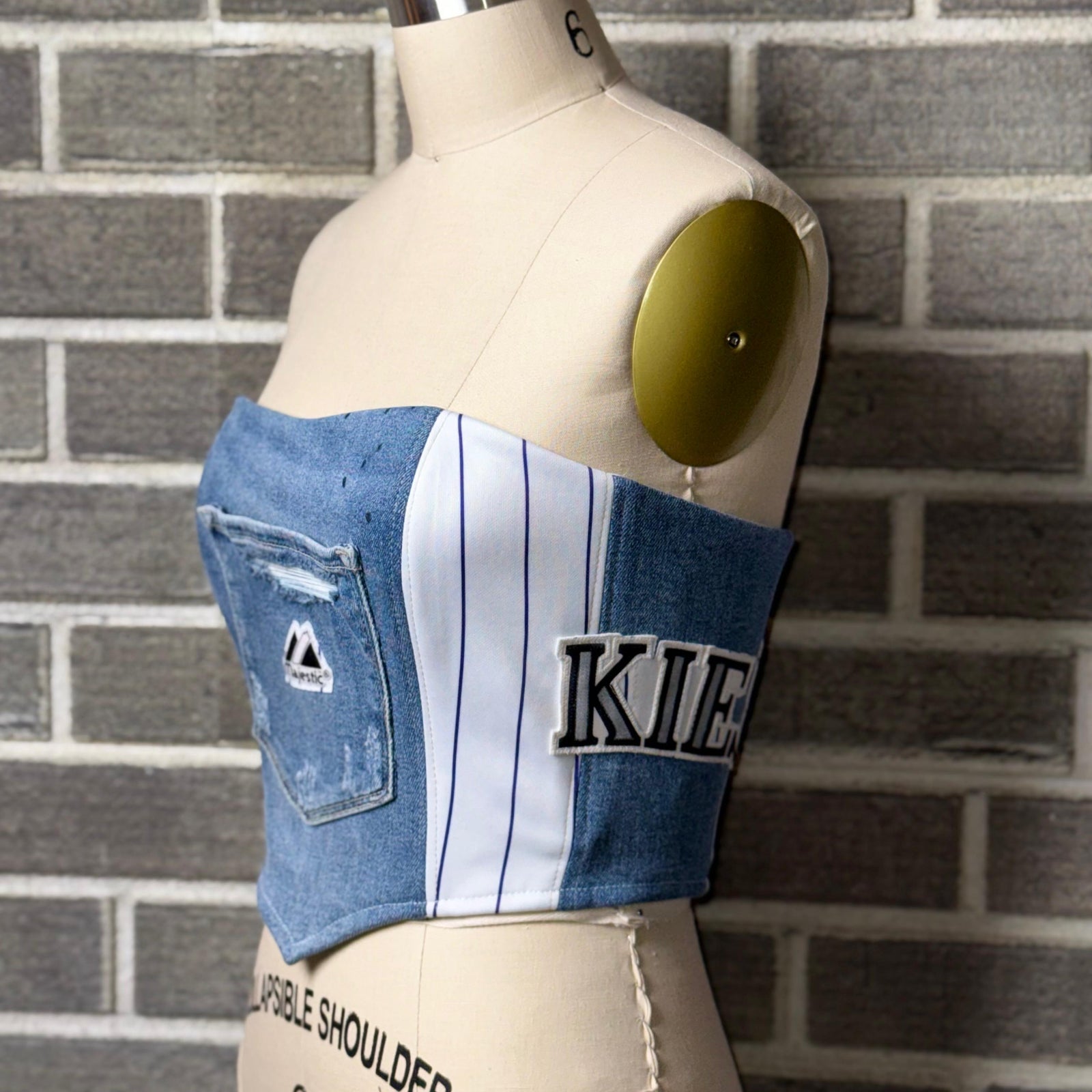 One-of-a-kind Colorado Rockies corset top made with reworked denim

