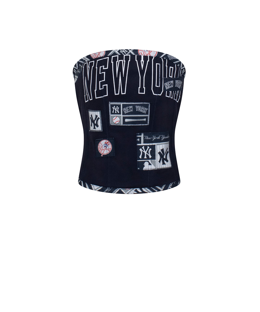 Custom Yankees jersey corset top for women, sustainable reworked fashion featuring bold patchwork details in navy blue.