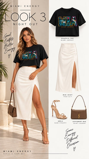 Black MIA crop top paired with an ivory satin midi skirt with a high slit and gold strappy heels